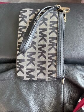 Michael Kors Black and Beige Logo Wristlet with Gold Hardware